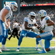 Marvin Jones (r.) celebrates touchdown with Frank Ragnow (l.) and Kerryon Johnson against Eagles in 2019.